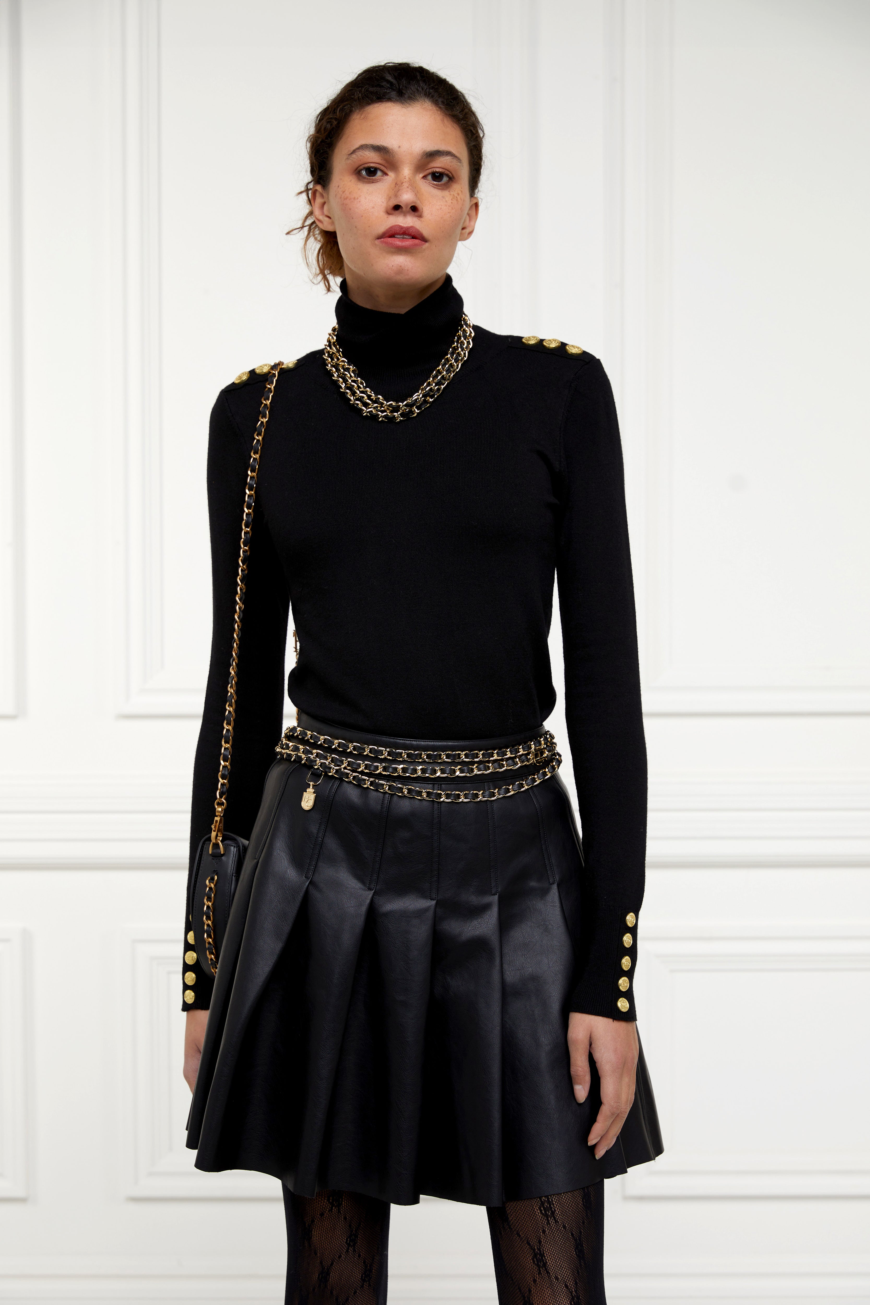 Pleated leather mini skirt black hotsell