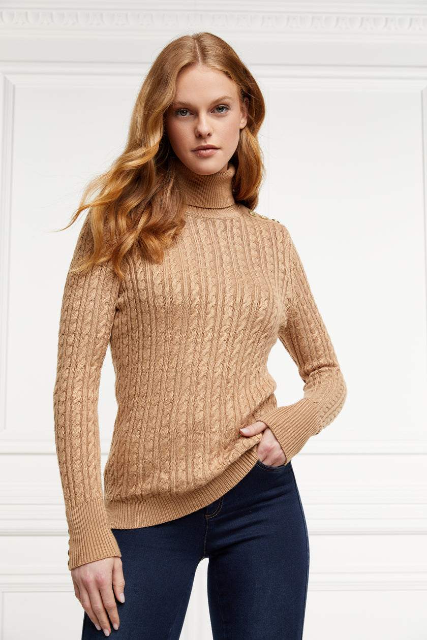 womens cable knit jumper in dark camel with ribbed roll neck cuffs and hem