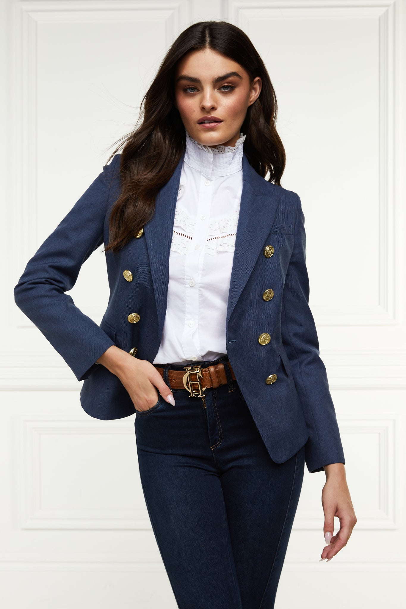 British made double breasted blazer that fastens with a single button hole to create a more form fitting silhouette with two pockets and gold button detailing this blazer in denim